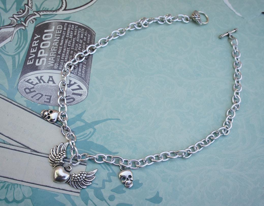 Olivia Paige - Silver heart  skulls rockabilly necklace