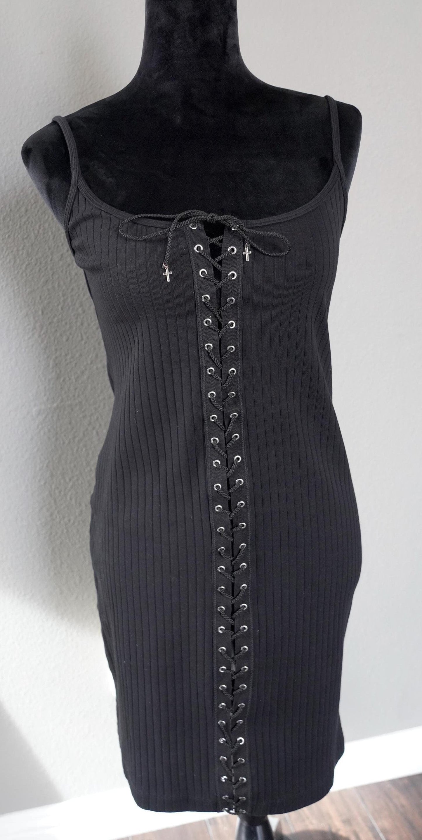 Olivia Paige -  Skinny Mid dress with front lace up Cross Charms